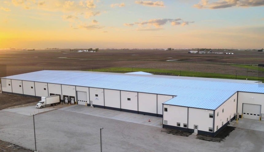 Liquid fertilizer and Agriculture chemical storage building at sunset