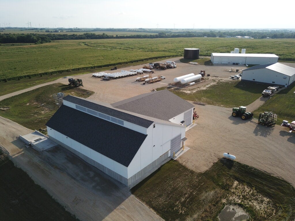 Growmark Ag Retailer location with a dry fertilizer building and a liquid fertilizer plant with ag chemical blending warehouse in walnut Illinois