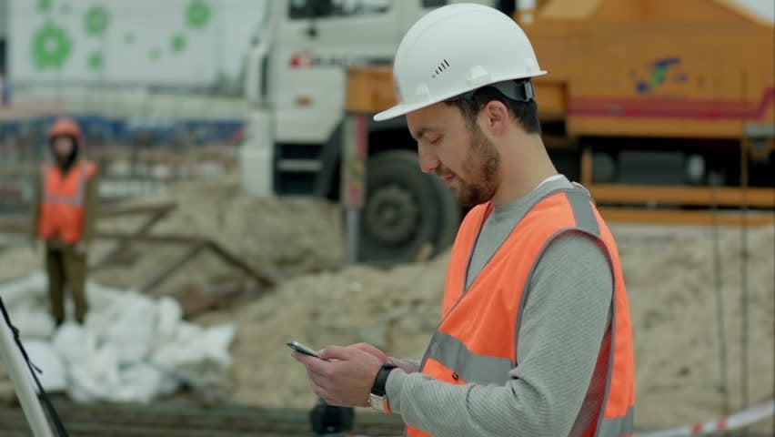 construction worker on cell phone can be dangerous