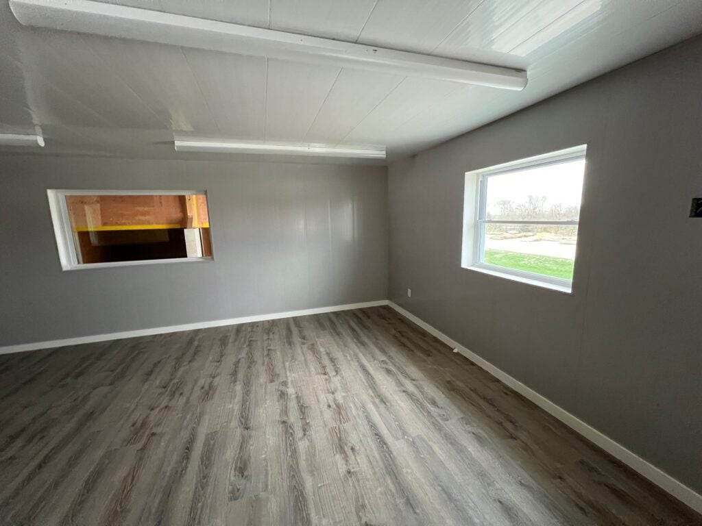 Dry fertilizer building office with trusscore wall and ceiling panels