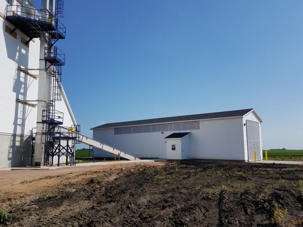 fertilizer truck receiving building and conveyor