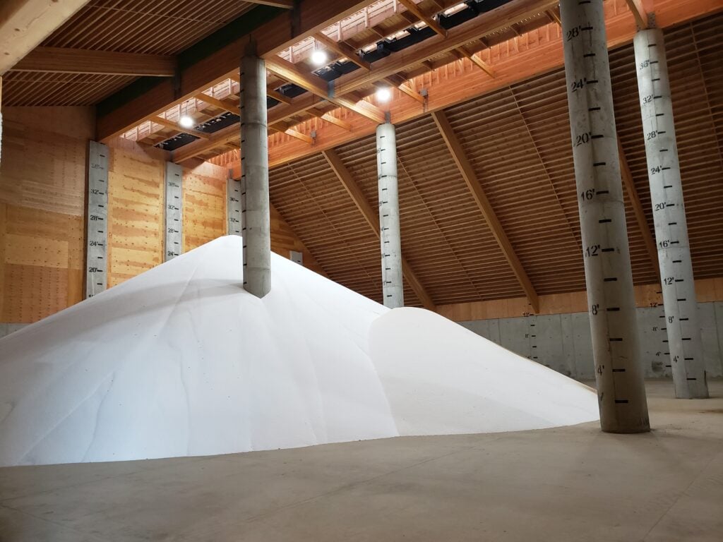 pile of fertilizer in dry fertilizer storage building