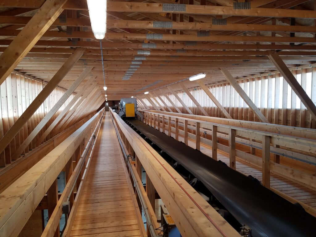 over bin catwalk and conveyor in fertilizer house
